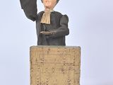 a statue of a man that is standing on a pedestal