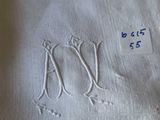 a close up of a piece of cloth with a monogram on it