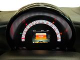 a close up of a car dashboard with a speedometer