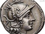 a close up of a coin with a woman ' s face on it