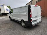 a white van that is parked in a parking lot