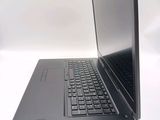 a laptop that is sitting on a white table
