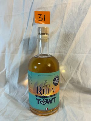 a bottle of liquor that is sitting on a table