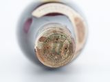 a close up of a bottle of wine with a cork stopper