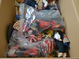 a cardboard box filled with toys and other items