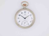 an old pocket watch with a white face on a white background