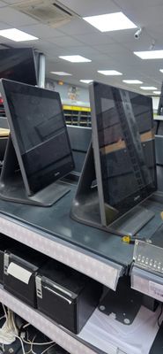 many computers on the shelves in the store