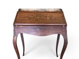 an image of a small wooden table with a tray on it