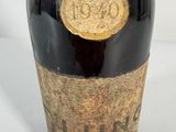 a bottle of wine that is sitting on a table