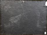 a picture of a black board on a wooden table