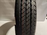 a close up of a tire on display on a table