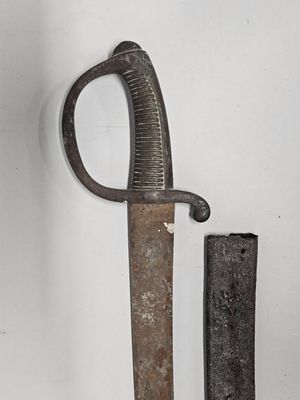 un couteau et un porte-couteau accrochés au mur