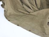 a blanket that is laying down on the ground