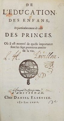 an old book with a picture of a globe on it