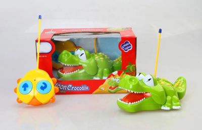 two toy dinosaurs that are sitting next to each other