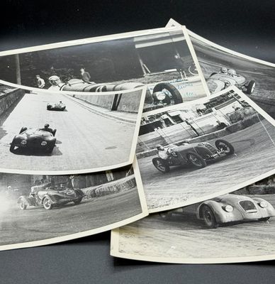 several old black and white photos of cars racing on a track