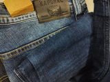 a pair of jeans and a pair of shoes in the back pocket of a pair of jeans