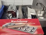 a box of bavolamp sitting on a kitchen counter