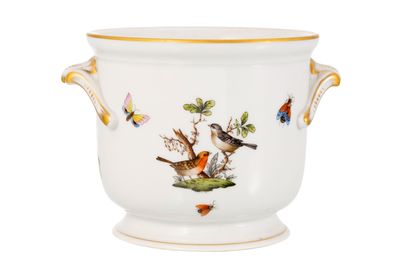 un vase blanc orné d'un motif d'oiseau