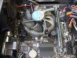 a close up of a computer motherboard with a fan
