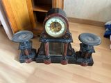 a clock that is sitting on top of a table