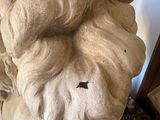 a statue of a man with a beard and a mustache