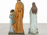 two figurines of jesus and a woman with a child