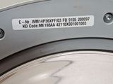 a close up of a washing machine with a label on it