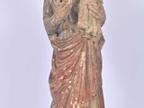 statue of a woman holding a child in her arms