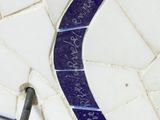 a close up of a piece of glass with writing on it