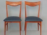 paire de chaises de salle à manger danoises en teck du milieu du siècle, avec assises rembourrées en cuir