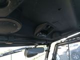 a view of the inside of a vehicle from the driver ' s seat