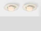 a pair of recess recessed downlights in a white finish