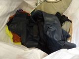 an image of a laundry basket with clothes in it