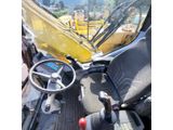 a view of a construction vehicle from the driver ' s seat