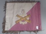 a pink and white flag with a cross on it