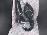 a pair of scissors in a plastic bag on a table
