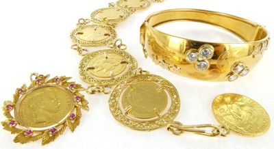 an image of a collection of gold jewelry including a bracelet, bracelet, and ring