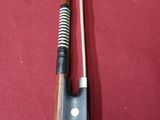 a pair of chopsticks sitting on a red cloth