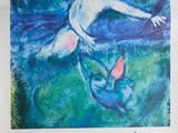 an image of a poster with a picture of an angel and a bird on it