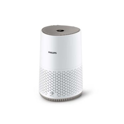 un purificateur d'air blanc posé sur une table blanche