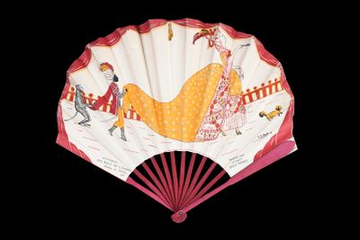 a fan with a painting on it on a black background