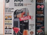 a box with a picture of a juicer inside of it