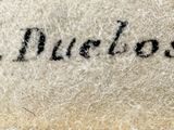a close up of a piece of paper with writing on it