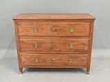 a wooden chest of drawers with brass pulls and brass handles