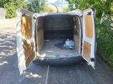 a van that is parked on the side of the road