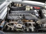 a picture of a car engine in the trunk of a car