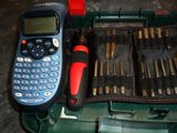 a cell phone that is sitting in a tool case