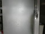 an image of a refrigerator in a kitchen with tile flooring