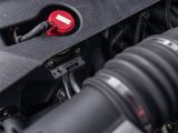 a close up view of a car ' s engine with its hood open